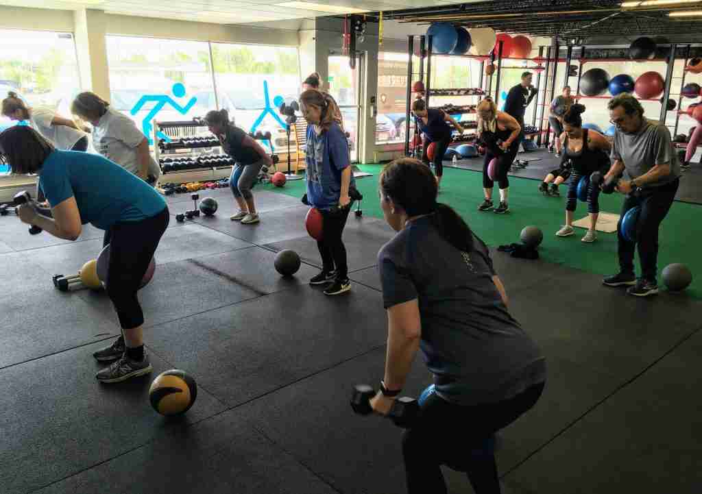 members working out at fitness studio