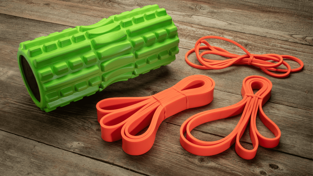hotel room workout equipment: resistance bands and a mini foam roller