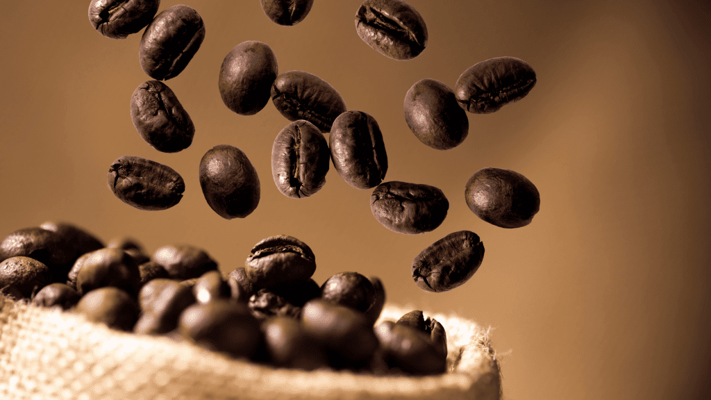 caffeine in the form of coffee beans being spilled from a bag